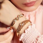 دستبند النگویی زنانه ژوپینگ طرح طلا کد RS-276